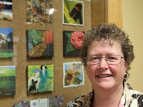 Joanne Franke is the co-ordinator for Six Squared, an art show run by the Seniors Association of Kingston in which all the submissions have to be six inches square. Some of last year's pieces are on display behind her.
Michael Lea The Whig-Standard