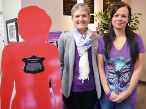 Megan Walker, executive director of London Abused Women’s Centre with Melissa Linton, sister of Jocelyn Bishop, the London woman who was murdered by her boyfriend in 2010. The 2013 Shine the Light on Woman Abuse campaign officially kicks off Nov. 1. (SHOBHITA SHARMA, QMI Agency)