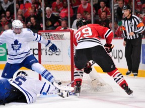 Blackhawks forward Bryan Bickell puts the puck past a sprawling Jonathan Bernier as Maple Leafs defenceman Paul Ranger is too late to help at the United Center in Chicago on Saturday night. Toronto lost the game 3-1. (Rob Grabowski/USA TODAY Sports)