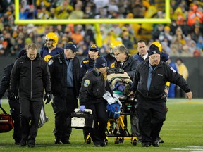 Green Bay Packers tight end Jermichael Finley (88) is taken off the field on a stretcher during the game against the Cleveland Browns in the 4th quarter at Lambeau Field. Mandatory Credit: Benny Sieu-USA TODAY Sports