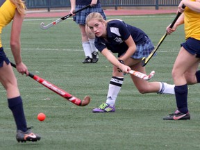 The Kingston Blues' Joelle Malcolm, playing in a game Oct. 7, scored two goals Monday to help the Blues earn a playoff berth in Kingston Area girls field hockey. The semifinals are Wednesday at the Invista Centre. (Ian MacAlpine/The Whig-Standard)