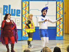 From left: villians Meagan McKinstry, Carmen Monoxide, Rebecca Merkley, Rocket Socket try to trick the super hero The Blue Flame, played by Erik Reuter, in a play promoting safety around energy products at Whitecourt Central School on Wednesday, Oct. 23.
Barry Kerton | Whitecourt Star