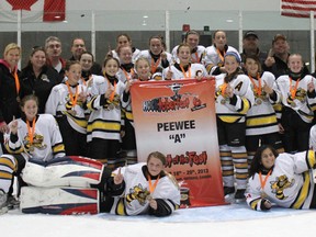 The Sarnia Jr. Lady Sting Peewee A team went undefeated to win gold at Hocktoberfest in Windsor this past weekend. After playing five games, the girls were victorious in the final. The game against Little Caesars ended in 0-0 tie after regulation and overtime. The Lady Sting won in the seventh round of a shootout. Pictured are, (front row) Emma Gorski, Michaela Simpson, (second row) Emma L’Heureux, Brooke Boelens, (third row) Hannah Thompson, Alex Rizkallah, Ainsley Jackson, Madison Milne, Kathleen Kerwin, Angie Aliperti, Abbie Williams, and (back row) Karen L’Heureux (Trainer), Karen Murray (Trainer), Matt Kerwin (Assistant Coach), Mike Simpson (Assistant Coach), Olivia Bressette, Amy Mullin, Erin Murray, Allison Barnes, Aubrey Cole, Payton Fleming, Mike Thompson (Assistant Coach), Lee Cole (Assistant Coach), Tracy Simpson (Manager), Brad Jackson (Head Coach).