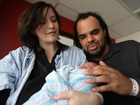 First-time mom and dad, Kendra Reid and Mitch Stone weren't expecting a baby. In fact, neither knew she was expecting at all, until their yet-to-be-named 8-pound son was born Monday, Oct. 21, 2013 in their washroom.
DOUG HEMPSTEAD/Ottawa Sun/QMI AGENCY