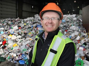 Derek Ochej, the city's solid waste public education co-ordinator, stands in front of the recycling collection site on Lappan's Lane. (Michael Lea The Whig-Standard)