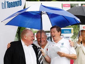 Toronto's Mayor Rob Ford, left, with brother and councillor Doug Ford and former mayoralty candidate John Tory share a laugh at the start of the recent CIMA Mayor's Cricket Trophy Tournament at Sunnybrook Park in Toronto.  
MICHAEL PEAKE/QMI Agency.