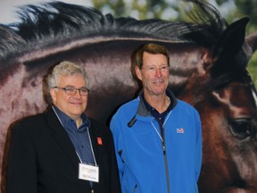 Charles Lapointe, president and managing director of Agribrands Purina Canada, a Cargill Inc. company, and 10-time Olympic show jumper Ian Millar stand at the newly renovated plant in Strathroy Oct. 23. The $11 million upgrades will focus on producing high quality equine feeds and supplements.
JACOB ROBINSON/AGE DISPATCH/QMI AGENCY