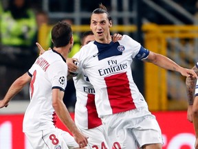 Paris Saint-Germain's Zlatan Ibrahimovic celebrates after scoring against Anderlecht during their Champions League match at Constant Vanden Stock stadium in Brussels October 23, 2013. (REUTERS/Francois Lenoir)