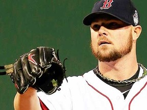 Jon Lester of the Boston Red Sox pitches against the St. Louis Cardinals in the first inning of Game 1of the 2013 World Series at Fenway Park on October 23, 2013 in Boston, Massachusetts.  (AFP)