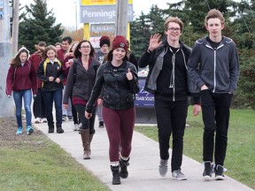 Hundreds of Regiopolis Notre-Dame students walk from their school to Holy Cross Secondary School to take part in the Miles for Mackenzie Walk to raise money for the OneMatch bone marrow transplant program and watch a junior and senior girls basketball game Thursday. 
IAN MACALPINE/KINGSTON WHIG-STANDARD/QMI AGENCY