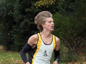 Holy Cross runners Matt (pictured) and Brad Sheeler both qualified for OFSAA at the WOSSAA Cross Country Championships at Springbank Park in London Oct. 24.
Matt was fifth in the senior boys race while Brad took silver in the junior boys event.
JACOB ROBINSON/AGE DISPATCH/QMI AGENCY