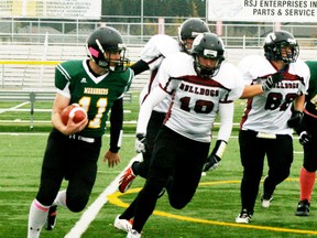 The front four on the defensive line for the Bellerose Bulldogs posed a problem for the Marauders in their league game, as they shut down their passing game and close off running lanes. - Gord Montgomery, Reporter/Examiner