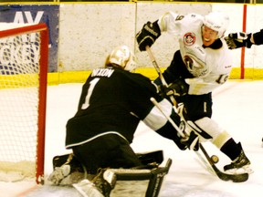 The Saints Cameron Hughes couldn’t quite get the handle on this bouncing puck during the Saints 2-0 win over division rival Sherwood Park. - Gord Montgomery, Reporter/Examiner