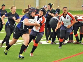 DeLeaka Menin, pictured here playing for County Central High School earlier this year, has just finished her first season of rugby for the University of Calgary and had been named Canada West's rookie of the year. Vulcan Advocate file photo