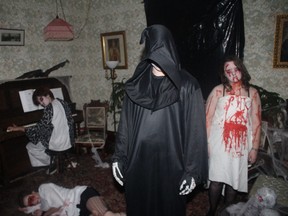 Beaver Brae and St. Thomas Aquinas students created disturbing vignettes in the rooms of the Mather Walls' haunted house.