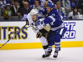 Toronto Maple Leafs forward David Clarkson (71) and Pittsburgh Penguins defenseman Olli Maatta (3) battle for position during the second period at the Air Canada Centre. Mandatory Credit: John E. Sokolowski-USA TODAY Sports