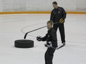 Sarnia Sting head coach Trevor Letowski is pictured instructing players during practice. The Sting sit in second last in the OHL's Western Conference through 15 games, but Letowski says their record is not indicative of their play. (SHAUN BISSON, The Observer)