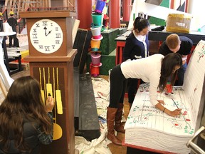 Queen's University engineering students are spending the week turning Grant Hall into a scene out of Alice in Wonderland for their 2013 Science Formal. The public is invited to an open house on Saturday. (Michael Lea The Whig-Standard)