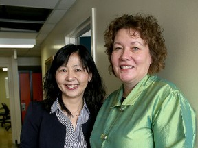 Queen's University researchers Shu-Ping Chen, left, and Heather Stuart on Tuesday as well as Terry Krupa (absent) received a $1.7 million grant from the Movember Foundation to look into the causes of excessive drinking among first-year male students. (Ian MacAlpine The Whig-Standard)