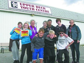 Youth from the Upper Deck Youth Centre will be 'trick or treating' Thursday afternoon from 3-5 p.m. for canned or boxed food items in a Halloween for Hunger food drive for the Helping Hand Food Bank. Three areas in town will be approached – in the residential areas of Maple Lane Public School, South Ridge Public School, and St. Joseph's Catholic School. If you have food donations for the Upper Deck youth, leave them on your front step for pick up. From left are (front row) Dawson Lumsden, Josh Cammaert, Joe Phipps, (back row) Becca Robinson, Denim Widdison, Barbara Donnen, Ashley Rosehart, Adam Ram, Brady Mudford and Julie Kennedy. CONTRIBUTED PHOTO