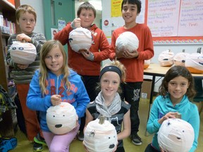 Ms. Mair's Grade 5 students display their completed ‘Pumpkin Mummies,’ a Halloween art activity in the class. In the front row, left to right, are: Liana LeBlanc, Taylor West and Keirghan Rockefeller. In the back, are: Tealc Pilkey, Brandon Cassone and Ethan DaCosta. Contributed Photo Courtesy of Jennifer Van Acker-Barlow