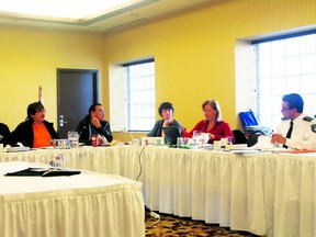 Erwin Redsky, Eli Mandamin, Gary Allen, Jackie McClaine, Kristine Gagne and Dan Davidson discuss the Treaty Three Police Services finances at a meeting of the board of directors in Dryden on Tuesday morning, Oct. 29.