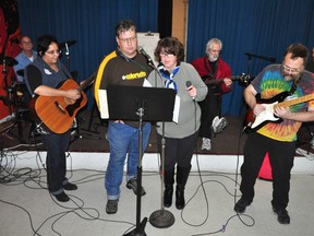 Musicians taking part in the Belong to Song program perform at Old East Studios on Dundas Street in London, Ont. Oct. 24. CHRIS MONTANINI\LONDONER\QMI AGENCY