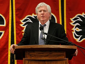 Former Maple Leafs general manager Brian Burke is playing the strong, silent type in his new role with the Calgary Flames. (Al Charest/QMI Agency)
