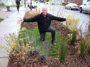 John Johnson the executive director of Sustainable KIngston in the mini park on Sydenham Street in front of their offices on Tuesday.
Ian MacAlpine The Whig-Standard