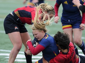 The Queen's Golden Gaels edged the host Laval Rouge et Or 19-17 in their opening game at the Canadian Interuniversity Sport women's rugby championship tournament Thursday. (QMI Agency)