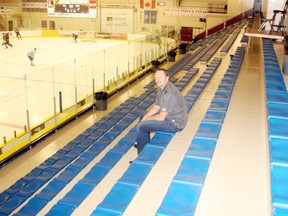 While somewhat over-dramatized, this picture shows how Saints owner Darren Myshak could feel at many of the home games for the Spruce Grove Saints during regular season action — all by himself in an almost empty building. - Gord Montgomery, Reporter/Examiner