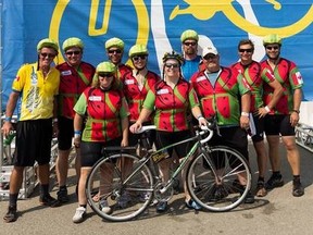 Stacie Woytowich and her cycling team the Melan Heads at the Enbridge Ride to Conquer Cancer in August 2013. - Photo Supplied