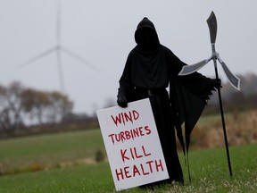 Ridgetown's Monica Elmes, spokesperson for the Chatham-Kent Wind Action Group, makes a statement in the wake of a recent survey concerning health impacts from turbines. (DIANA MARTIN, The Daily News)