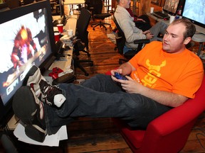 dmonton Extra Life co-organizer Matthew Dykstra plays a video game during the Extra Life game marathon at the Startup Edmonton space inside the Mercer Building, 10363-104 Street, Sunday October 21, 2012. The Edmonton Extra Life 24-hour gaming marathon was a fundraiser for the Stollery Children's Hospital. DAVID BLOOM EDMONTON SUN
