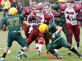 Bay of Quinte senior football final action between Moira Secondary School Trojans (maroon and white jerseys) and Centennial Secondary School Chargers at M.A. Sills Park in Belleville, Ont. Saturday, Nov. 2, 2013. -  JEROME LESSARD/The Intelligencer