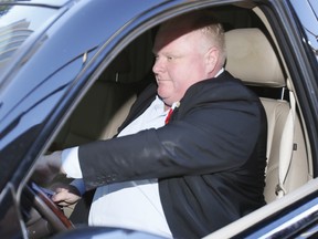 Mayor Rob Ford drives off after finishing his weekly radio show at Newstalk 1010 on Sunday, Nov. 3, 2013. (STAN BEHAL/Toronto Sun)