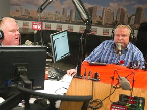 Toronto Mayor Rob Ford, left, and his brother Doug on the Ford's weekly radio show at Newstalk 1010 on Sunday. (Reuters)