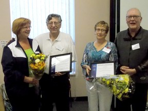Rosemarie Mayan, second from right, accepts her award from Juanita Knight, Vice President of ARTA (Alberta Retired Teacher’s Association), along with Robin Stuart (Award recipient from HARTA-Leduc branch) while Ron Thompson, President of the Heartland Alberta Retired Teachers Association looks on.