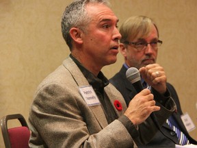 Patrick Donnelly, of the Lake Huron Centre for Coastal Conservation, answers a question at the Great Lakes Water Levels Public Forum held in Point Edward, Ont. Tuesday, Nov. 5, 2013. Conservationists challenged a recommendation to erect a structure in the St. Clair River to address low water levels. (BARBARA SIMPSON, The Observer)