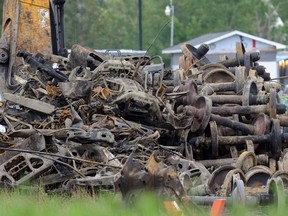 Scorched train parts are piled up for decontamintation following the explosion in Lac Megantic earlier this year. 
STEVENS LEBLANC/QMI AGENCY