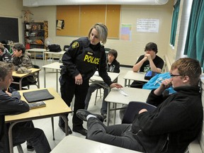 Central Hastings OPP Constable Alana Deubel takes Grade 11 students at Centre Hastings Secondary School through a scenario to illustrate the dangers of texting and driving.