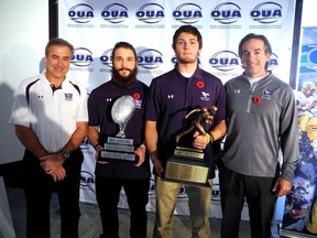 Western OUA award winners: from left, Greg Marshall, coach of the year; Pawel Kruba, standup defensive player of the year; Will Finch, most outstanding player; Paul Gleason, volunteer coach of the year. (MORRIS DALLA COSTA, The London Free Press)