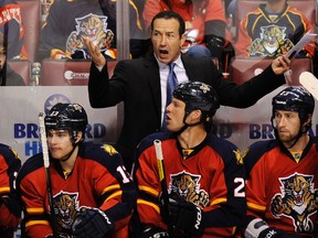 The Florida Panthers fired head coach Kevin Dineen, above, and assistant coaches Gord Murphy and Craig Ramsay. (Reuters)