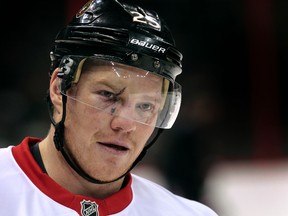 Ottawa Senators Chris Neil during practice at the Canadian Tire Centre in Ottawa On, Friday, Nov 8, 2013. Neil's face was a little beat up after Erik Karlsson hit him with a puck in the game against Montreal Thursday night.  Tony Caldwell/Ottawa Sun/QMI Agency
