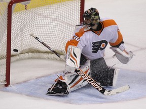 Philadelphia Flyers goaltender Ilya Bryzgalov gives up a goal during NHL action against the Winnipeg Jets  Sat., April 6, 2013 at MTS Centre in Winnipeg, Man. (KEVIN KING/QMI Agency)