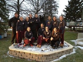 The Portage Collegiate Saints varsity volleyball team pose after finishing as tournament finalists in the Killarney varsity tournament on the weekend. (Submitted photo)