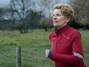 Premier Kathleen Wynne runs in a new Liberal ad released Wednesday, Nov. 13, 2013. (Framegrab)