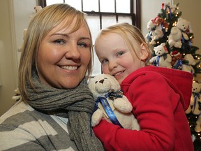 Aly Davis, 5, a former pediatric oncology patient at KGH, with her mother Audrey Jones, holds one of the teddy bears that will be sponsored during the annual Teddy Bear Campaign at the hospital to raise money for pediatric equipment.
Michael Lea The Whig-Standard