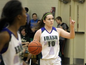 St. Patrick's Fighting Irish guard McKenzie Turner walks the ball up the court during the first half of the SWOSSAA AAAA finals in Sarnia on Wednesday, Nov. 13. The Irish defeated Holy Names 56-42 to earn a berth in the OFSAA championships, which begin on Friday in Windsor. (SHAUN BISSON, The Observer)