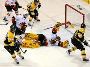 Belleville Bulls goalie Charlie Graham makes a save during Wednesday's OHL action against the Kingston Frontenacs at the Yardmen Arena in Belleville. The Bulls won 6-3. (Emily Mountney QMI Agency)